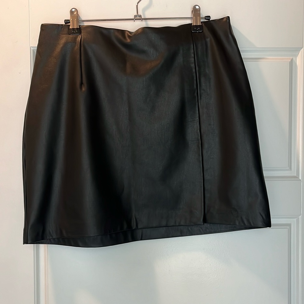 Faux leather mini skirt with slit. Dynamite. Size Large. Like new.